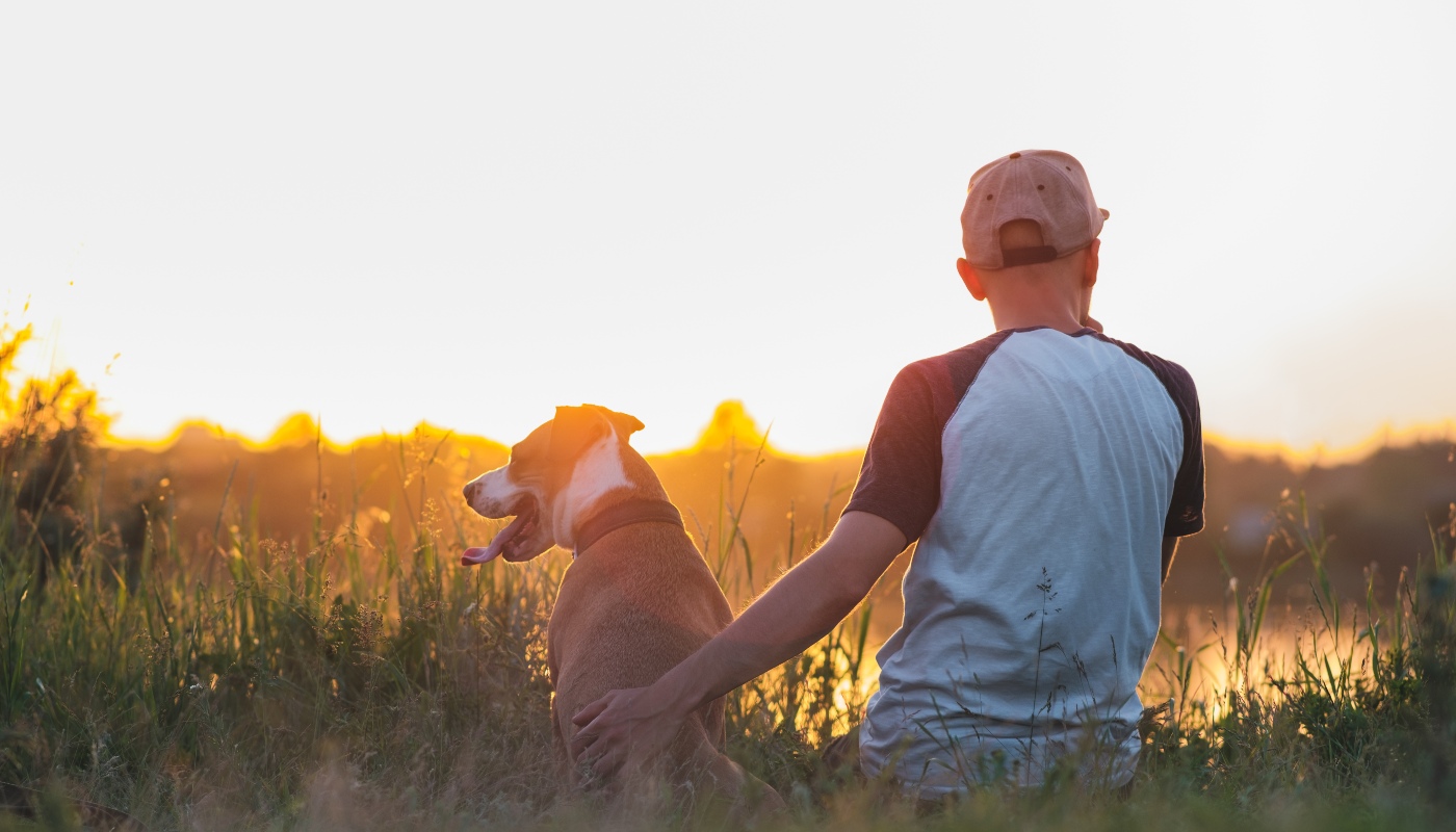 A man with his dog - How Service Dogs Can Change a Life in Katy, TX. Dog Training Elite 