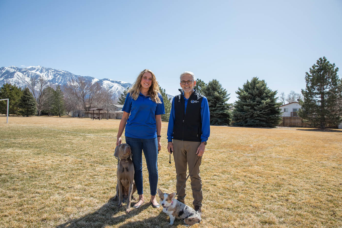 Two Dog Training Elite experts teaching dogs at one of our expert Baltimore / Towson  dog training classes.